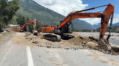 The National Highways Authority of India conducts restoration work of National Highways on the Kullu-Manali section after flash floods and heavy rains, on Monday. (ANI) The National Highways Authority of India conducts restoration work of National Highways on the Kullu-Manali section after flash floods and heavy rains, on Monday. (ANI)