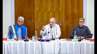 Union Home Minister Amit Shah with J&K LG Manoj Sinha and Chief Minister Omar Abdullah chairs a meeting to review the recent flood situation in Jammu. (PTI) Union Home Minister Amit Shah with J&K LG Manoj Sinha and Chief Minister Omar Abdullah chairs a meeting to review the recent flood situation in Jammu. (PTI)