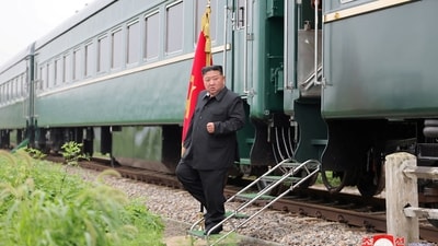 North Korean leader Kim Jong Un steps off a train during a visit to a flood-affected area near the border with China, in North Pyongan Province, North Korea. (File Photo/Sourced by Reuters)
