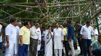 West Bengal chief minister Mamata Banerjee along with ministers interacts with media after the army dismantled a stage erected beside the Gandhi statue in Maidan area on Monday (HT Photo/Samir Jana) West Bengal chief minister Mamata Banerjee along with ministers interacts with media after the army dismantled a stage erected beside the Gandhi statue in Maidan area on Monday (HT Photo/Samir Jana)