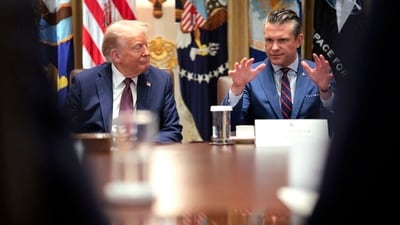 Defense Secretary Pete Hegseth sits next to President Trump during a cabinet meeting. Defense Secretary Pete Hegseth sits next to President Trump during a cabinet meeting.