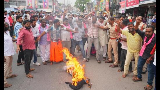 BRS workers protesting against the CBI probe ordered by the Telangana government after a marathon debate on the Kaleshwaram lift irrigation project, in Warangal on Monday. (HT PHOTO)