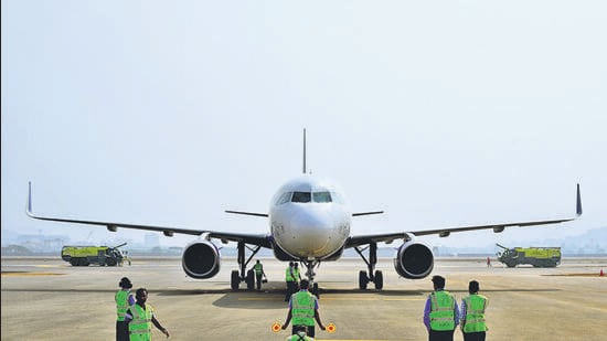 Navi Mumbai, India - Dec. 29, 2024:First commercial aircraft landing on the runway of Navi Mumbai International Airport Ltd at Ulwe in Navi Mumbai, India, on Sunday, December 29, 2024. (Photo by Bachchan Kumar/ HT PHOTO) (HT PHOTO)