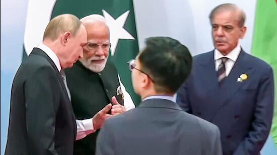 Prime Minister Narendra Modi, Russian President Vladimir Putin, during a group photograph at the Shanghai Cooperation Council Summit in Tianjin, China on Monday. (DD News/ANI Video Grab)