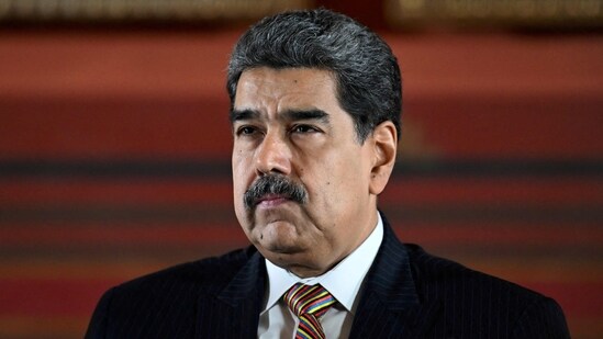 Though the US has not signaled a land incursion, Venezuelan President Nicolás Maduro deployed troops on the coast and Colombia border and urged citizens to join militias. (AFP)
