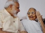 File photo of Prime Minister Narendra Modi spending time with his mother on his birthday at her Gandhinagar residence. (PTI) File photo of Prime Minister Narendra Modi spending time with his mother on his birthday at her Gandhinagar residence. (PTI)