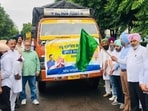 Punjab finance minister Harpal Singh Cheema flagging off relief material to flood-hit Ajnala from Mohali on Monday. (HT) Punjab finance minister Harpal Singh Cheema flagging off relief material to flood-hit Ajnala from Mohali on Monday. (HT)