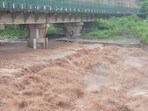 The Ghaggar in spate in Panchkula on Monday. (SANT ARORA/HT) The Ghaggar in spate in Panchkula on Monday. (SANT ARORA/HT)