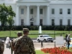 Mysterious black bag hurled from White House window, triggering online speculations (Photo by ANDREW CABALLERO-REYNOLDS / AFP) Mysterious black bag hurled from White House window, triggering online speculations (Photo by ANDREW CABALLERO-REYNOLDS / AFP)