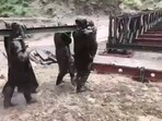 This is the second such bridge constructed by the Army in the wake of last week's record rainfall. This is the second such bridge constructed by the Army in the wake of last week's record rainfall.
