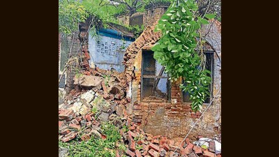 A collapsed wall of Congress Bhawan located in clock tower road in Ludhiana on Tuesday. (HT Photo)