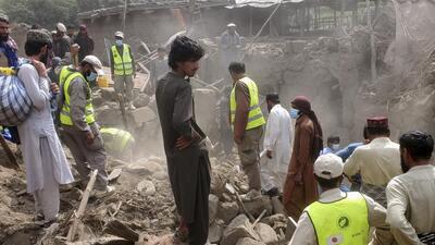 Civil defene workers, locals, and army soldiers clear rubble after a powerful 6-magnitude earthquake struck eastern Afghanistan on Sunday, killing many people and destroying villages, in Mazar Dara, Kunar province, (AP) Civil defene workers, locals, and army soldiers clear rubble after a powerful 6-magnitude earthquake struck eastern Afghanistan on Sunday, killing many people and destroying villages, in Mazar Dara, Kunar province, (AP)