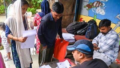 DDA officials verify documents of residents of the slum clusters. (Vipin Kumar/HT Photo) DDA officials verify documents of residents of the slum clusters. (Vipin Kumar/HT Photo)