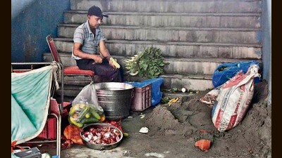 Food for the players participating in the championship being prepared near the construction material at Guru Nanak Stadium in Ludhiana on Tuesday. (Manish/HT)