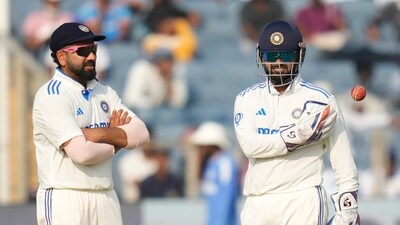Rohit Sharma, left, chats with Rishabh Pant (AP) Rohit Sharma, left, chats with Rishabh Pant (AP)