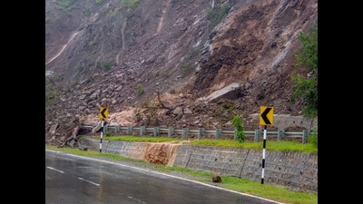 Live boulders and a mudslide (slush) tumble down from a hilltop onto the road on the up tube of the Jammu-Srinagar National Highway near Thard, in Udhampur on Tuesday. (ANI)