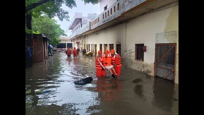 NDRF teams rescuing workers stranded in the factory in Jalandhar’s Lohara village. (HT) NDRF teams rescuing workers stranded in the factory in Jalandhar’s Lohara village. (HT)