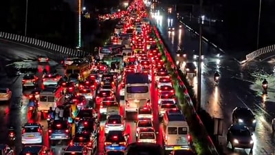 An aerial view of the vehicles stuck in a traffic jam following rainfall in Gurugram, shows the true extent of the snarls faced by the public (PTI) An aerial view of the vehicles stuck in a traffic jam following rainfall in Gurugram, shows the true extent of the snarls faced by the public (PTI)