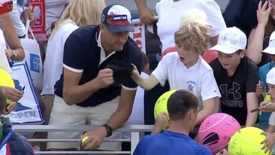 Polish CEO Piotr Szczerek was caught swiping an autographed hat from a child at the US Open. (X/@Arrucha) Polish CEO Piotr Szczerek was caught swiping an autographed hat from a child at the US Open. (X/@Arrucha)