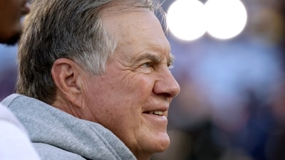 North Carolina head coach Bill Belichick watches as his team warms up before an NCAA college football game against TCU, (AP) North Carolina head coach Bill Belichick watches as his team warms up before an NCAA college football game against TCU, (AP)