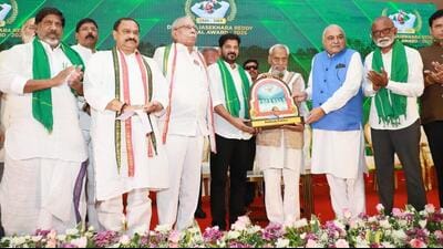 Telangana chief minister A Revanth Reddy presenting the YSR Memorial Award to pioneer of natural farming Subhash Palekar at an event in Hyderabad on Tuesday. (HT PHOTO) Telangana chief minister A Revanth Reddy presenting the YSR Memorial Award to pioneer of natural farming Subhash Palekar at an event in Hyderabad on Tuesday. (HT PHOTO)