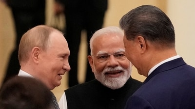 Prime Minister Narendra Modi talks with Russian President Vladimir Putin and Chinese President Xi Jinping ahead of the Shanghai Cooperation Organisation (SCO) Summit 2025 at the Meijiang Convention and Exhibition Centre in Tianjin, China, on September 1, 2025. (REUTERS)