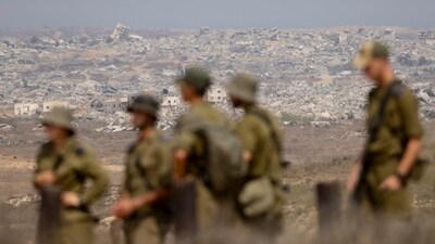Israeli soldiers overlooking destroyed buildings in the northern Gaza Strip last month.