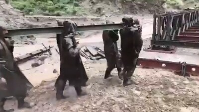 This is the second such bridge constructed by the Army in the wake of last week's record rainfall. (PRO Defence Jammu/X) This is the second such bridge constructed by the Army in the wake of last week's record rainfall. (PRO Defence Jammu/X)
