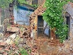 A collapsed wall of Congress Bhawan located in clock tower road in Ludhiana on Tuesday. (HT Photo) A collapsed wall of Congress Bhawan located in clock tower road in Ludhiana on Tuesday. (HT Photo)