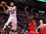 Former Philadelphia 76ers guard Ben Simmons (25) makes a pass against Chicago Bulls forward JaKarr Sampson (41)
