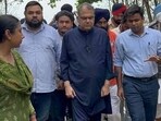 Cabinet minister Sanjeev Arora and Ludhiana deputy commissioner Himanshu Jain among others take stock of the situation in Sasrali Colony on Tuesday. (HT Photo)