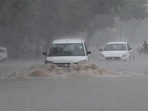 Commuters driving through a waterlogged road in Phase 11 Mohali during heavy rain on Wednesday morning. (Keshav Singh/HT) Commuters driving through a waterlogged road in Phase 11 Mohali during heavy rain on Wednesday morning. (Keshav Singh/HT)