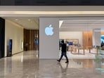 A man walks past by the Apple Koregaon Park store in KOPA, Pune.