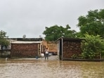 A resident speaks on his mobile phone after his area was cut off by floodwaters following heavy rains in Kapurthala district of northern state of Punjab, India, Tuesday, Sept. 2, 2025. (AP Photo/Prabhjot Gill) A resident speaks on his mobile phone after his area was cut off by floodwaters following heavy rains in Kapurthala district of northern state of Punjab, India, Tuesday, Sept. 2, 2025. (AP Photo/Prabhjot Gill)