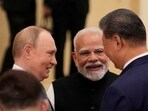 Indian Prime Minister Narendra Modi talks with Russian President Vladimir Putin and Chinese President Xi Jinping ahead of the Shanghai Cooperation Organization (SCO) Summit 2025 at the Meijiang Convention and Exhibition Centre in Tianjin, China, 
