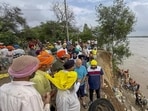 Punjab AAP affairs in-charge Manish Sisodia during a visit to a flood-hit area at Marar village in Patti assembly constituency on Wednesday. (PTI Photo)