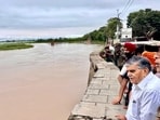 Punjab governor Gulab Chand Kataria reviewing the damage caused by the Sutlej river that is overflowing due to heavy rain in the region on Tuesday. (HT Photo) Punjab governor Gulab Chand Kataria reviewing the damage caused by the Sutlej river that is overflowing due to heavy rain in the region on Tuesday. (HT Photo)