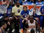 Los Angeles Clippers' Kawhi Leonard, in yellow, sits on the bench Los Angeles Clippers' Kawhi Leonard, in yellow, sits on the bench