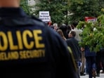 Homeland Security police officer stands behind a press conference called by Boston Mayor Michelle Wu. (Representational)