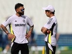 India's Virat Kohli (L) chats with India's head coach Gautam Gambhir during training session.