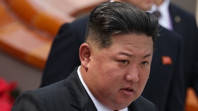 North Korea's leader Kim Jong Un walks after taking a group photograph during a military parade marking the 80th anniversary of victory over Japan and the end of World War II. (AFP) North Korea's leader Kim Jong Un walks after taking a group photograph during a military parade marking the 80th anniversary of victory over Japan and the end of World War II. (AFP)