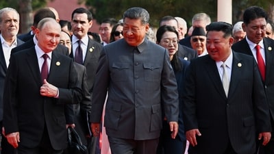 Russian President Vladimir Putin, Chinese President Xi Jinping and North Korean leader Kim Jong Un arrive at a military parade in Beijing. (AP) Russian President Vladimir Putin, Chinese President Xi Jinping and North Korean leader Kim Jong Un arrive at a military parade in Beijing. (AP)