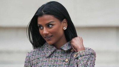 Simone Ashley stuns in Chanel, wearing a multicoloured plaid jacket and a mini skirt. (AFP) Simone Ashley stuns in Chanel, wearing a multicoloured plaid jacket and a mini skirt. (AFP)