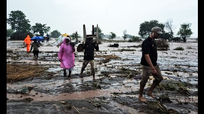 Flood-affected people moving to safer places in Gadkhal area of Akhnoor, in Jammu, on Wednesday. (ANI) Flood-affected people moving to safer places in Gadkhal area of Akhnoor, in Jammu, on Wednesday. (ANI)