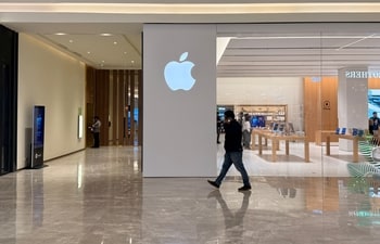 A man walks past by the Apple Koregaon Park store in KOPA, Pune. (Shaurya Sharma/HT)