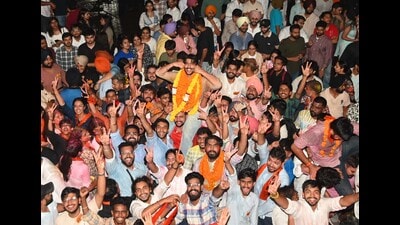 Newly elected PUCSC president Gauravveer Sohal of the ABVP celebrating his victory with his supporters, at Panjab University, Chandigarh, on Wednesday. (Keshav Singh/HT)
