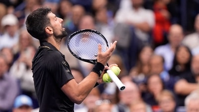 Novak Djokovic quarrels against the chair umpire during his US Open quarterfinal. (IMAGN IMAGES via Reuters Connect)