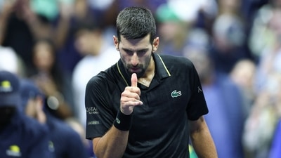 Serbia's Novak Djokovic gestures after winning the men's singles quarterfinal tennis match against USA's Taylor Fritz (AFP) Serbia's Novak Djokovic gestures after winning the men's singles quarterfinal tennis match against USA's Taylor Fritz (AFP)