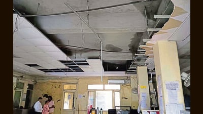 The collapsed false ceiling at the Focal Point office in Ludhiana on Wednesday. (HT Photo) The collapsed false ceiling at the Focal Point office in Ludhiana on Wednesday. (HT Photo)