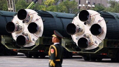 A member of the People's Liberation Army stands as the strategic strike group displays DF-5C nuclear missiles during a military parade to mark the 80th anniversary of the end of World War Two, in Beijing, China, September 3, 2025. (REUTERS)